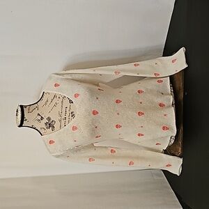 Wooden Shipe White Sweater with Pink Skulls